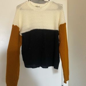 Orange and black sweater